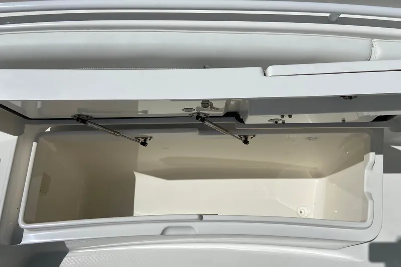 Slide: The Image of Open storage compartment on a 2021 Regulator 28 boat, showcasing interior space. - 40
