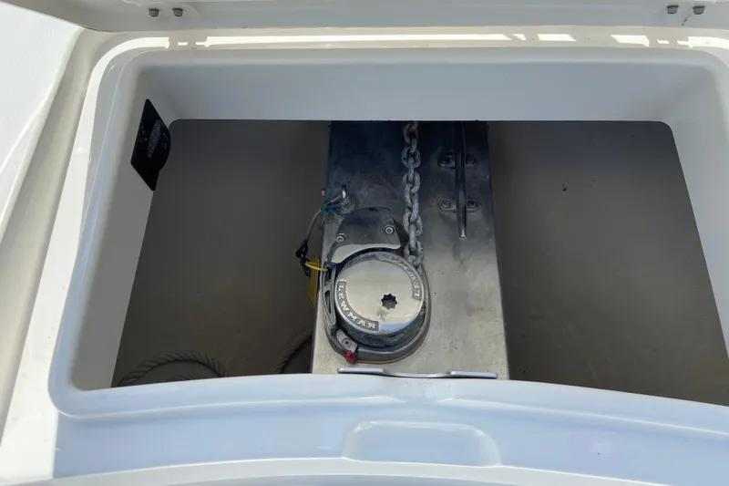 Slide: The Image of Anchor locker of 2021 Regulator 28 boat with chain and winch. - 43