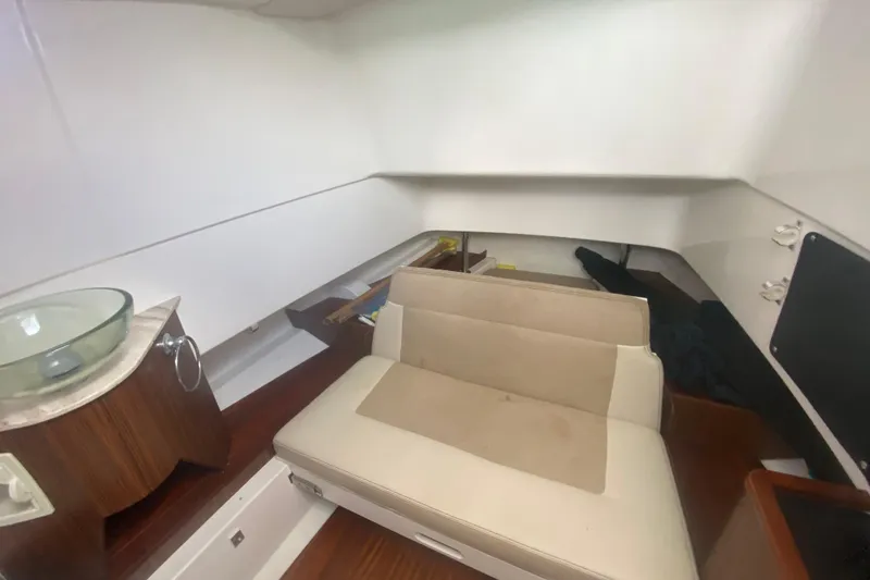 Slide: The Image of Interior cabin of 2019 Pursuit S 328 Sport boat with seating and sink. - 35