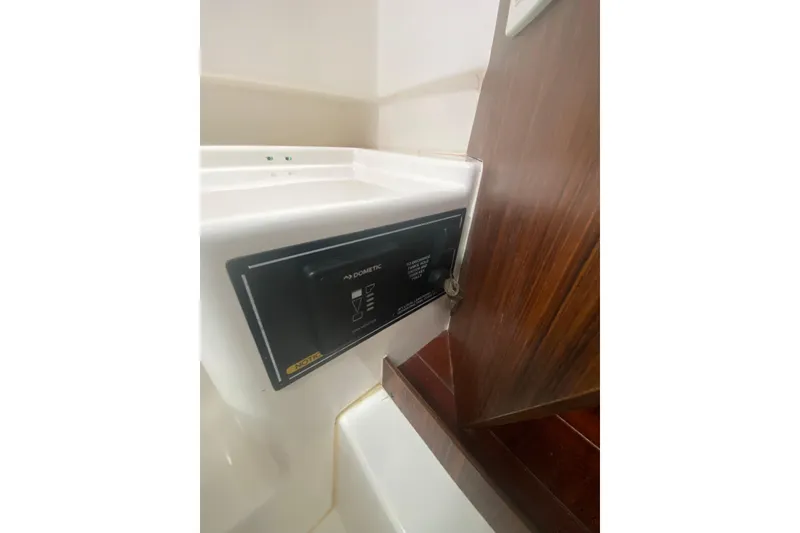 Slide: The Image of Control panel on 2019 Pursuit S 328 Sport boat, featuring Dometic system. - 38