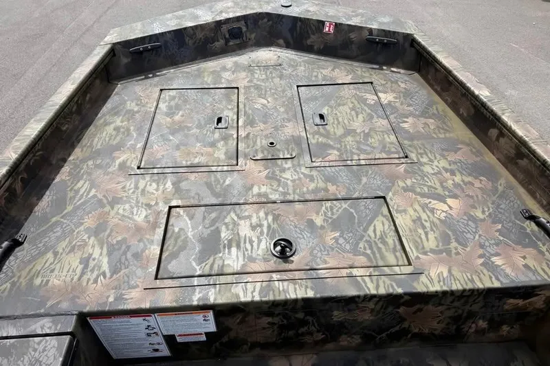 Slide: The Image of Crestliner 1760 Retriever Jon 2027 boat with camouflage deck design. - 8