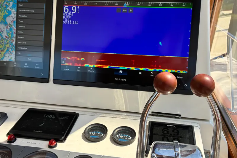 Slide: The Image of Boat dashboard with Garmin navigation display on Little Harbor WhisperJet 40, 2000 model. - 17