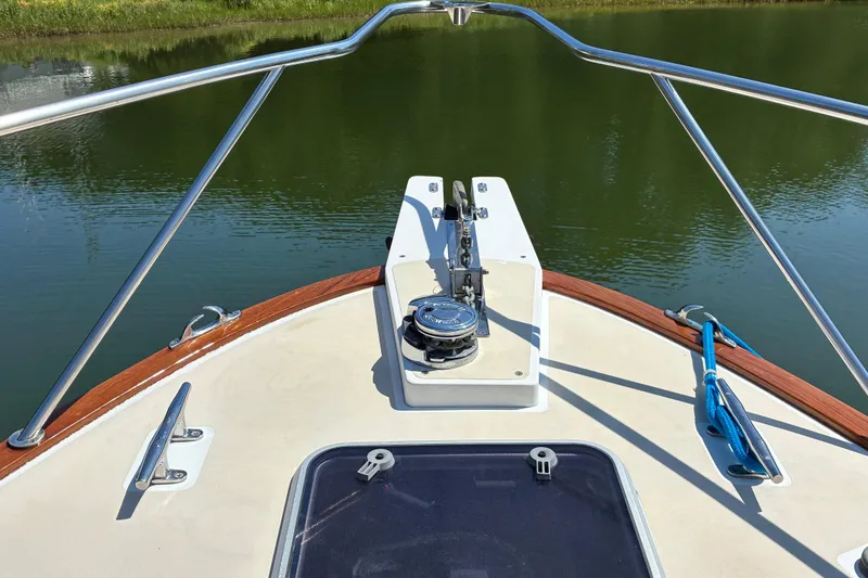 Slide: The Image of Bow view of 2000 Little Harbor WhisperJet 40 on calm water. - 8