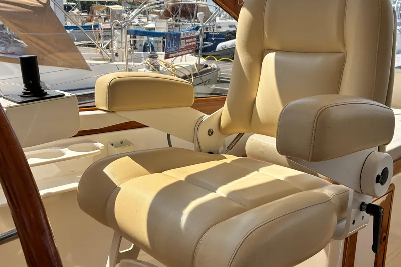 Slide: The Image of Captain's chair on a 2000 Little Harbor WhisperJet 40 yacht, with joystick control. - 18
