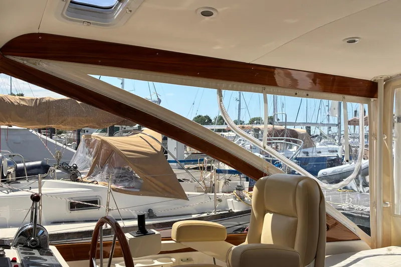 Slide: The Image of Interior view of a 2000 Little Harbor WhisperJet 40 yacht at a marina. - 20