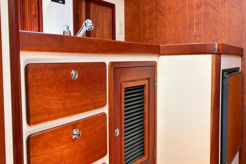 Slide: The Image of Wooden cabinetry and sink in 2000 Little Harbor WhisperJet 40 yacht interior. - 30