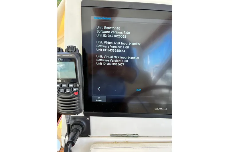 Slide: The Image of Garmin device display on 2000 Little Harbor WhisperJet 40, showing software versions and unit IDs. - 53