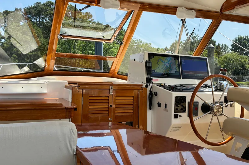 Slide: The Image of Interior view of a 2000 Little Harbor WhisperJet 40 yacht cockpit with navigation equipment. - 9