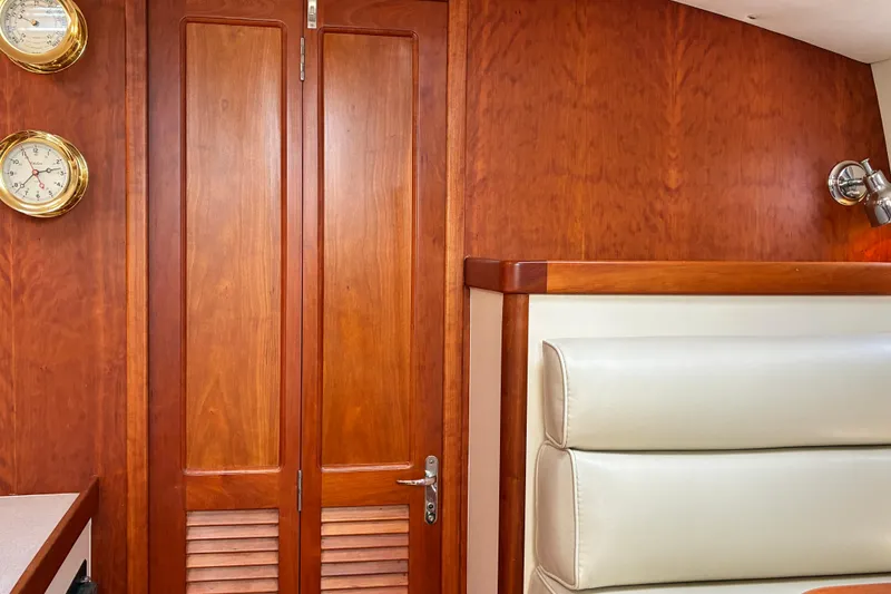 Slide: The Image of Interior of 2000 Little Harbor WhisperJet 40 with wooden paneling and nautical instruments. - 33