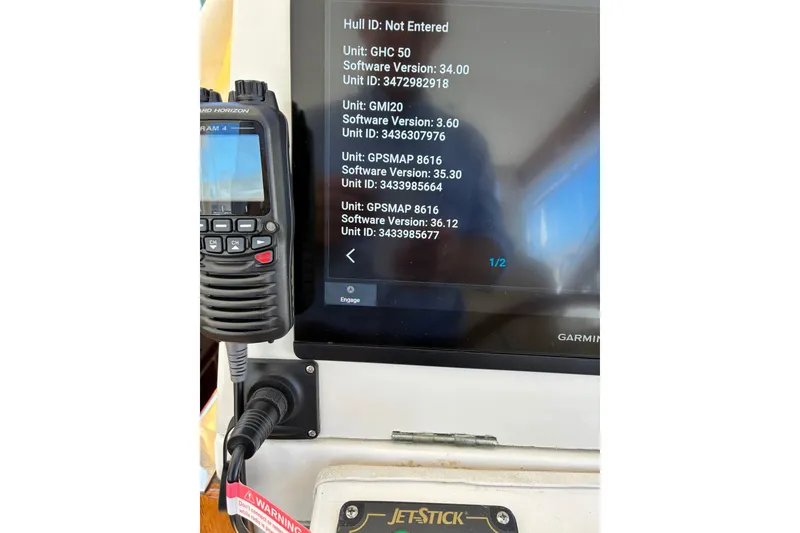 Slide: The Image of Control panel of a 2000 Little Harbor WhisperJet 40 with navigation equipment. - 52