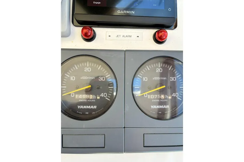 Slide: The Image of Close-up of Yanmar engine gauges on a 2000 Little Harbor WhisperJet 40 boat. - 56