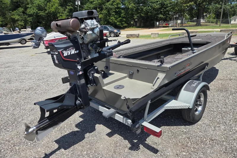 Slide: The Image of 2024 Gator Tail Extreme series boat with powerful outboard motor on trailer. - 6