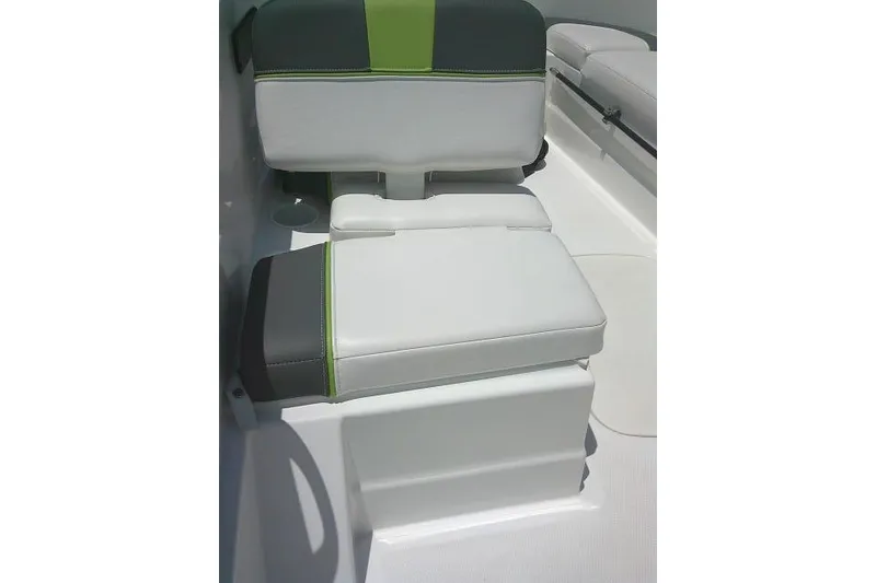 Slide: The Image of 2022 Tahoe T16 boat seat with white, gray, and green upholstery. - 14