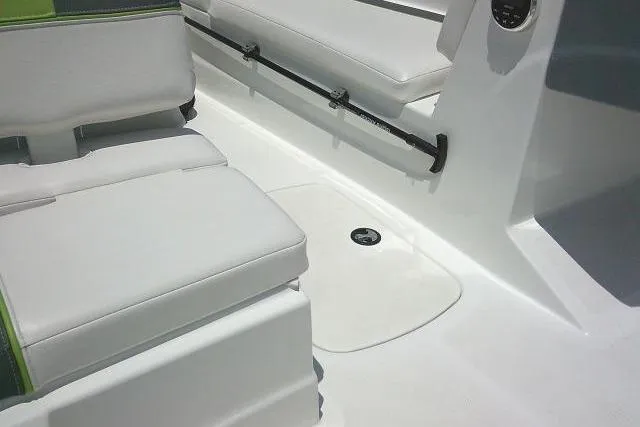 Slide: The Image of 2022 Tahoe T16 boat interior with white seating and sleek design. - 13