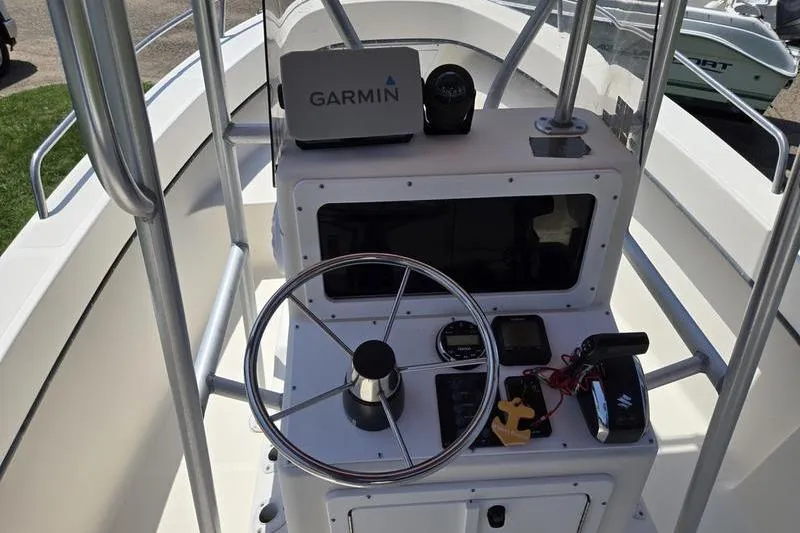 Slide: The Image of Center console of a 2000 May-Craft 2000CC boat with Garmin navigation system. - 9
