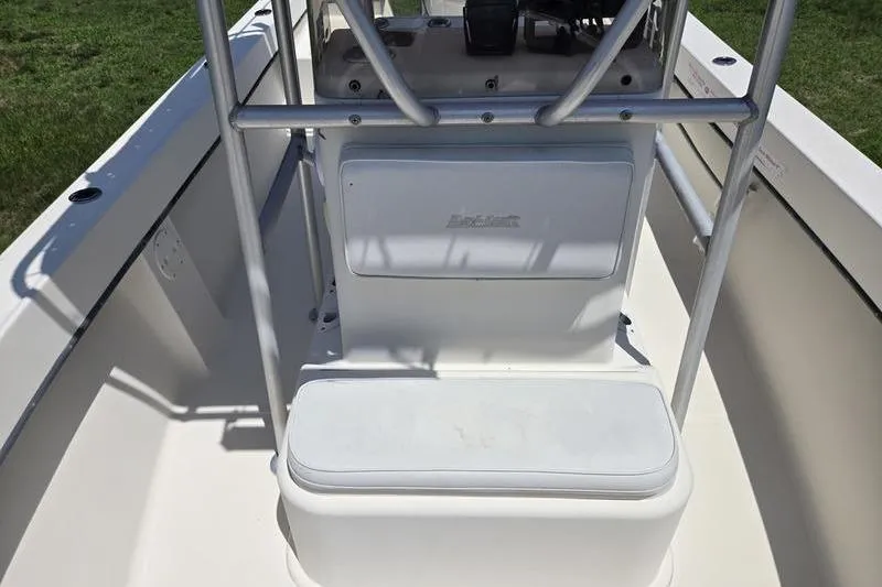 Slide: The Image of 2000 May-Craft 2000CC boat interior with seating and console. - 10