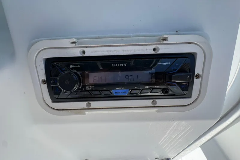 Slide: The Image of Sony marine stereo system on a 2000 Stamas 250 Tarpon boat dashboard. - 39