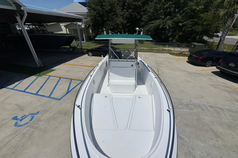 Slide: The Image of 2000 Stamas 250 Tarpon boat in parking lot, viewed from above. - 23
