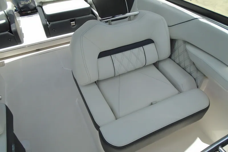 Slide: The Image of Luxurious seating in the 2024 Regal LX4 boat, featuring elegant white upholstery. - 9
