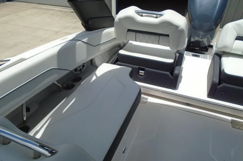 Slide: The Image of 2024 Regal LX4 boat interior with luxurious seating and modern design. - 15