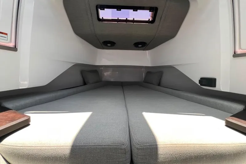 Slide: The Image of Interior cabin of 2023 Axopar Brabus 37 Sun-Top with comfortable seating and modern design. - 15