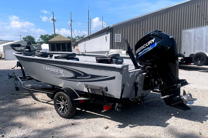 Slide: The Image of 2025 Smoker Craft Freedom 160 TL boat with Mercury engine on trailer. - 5