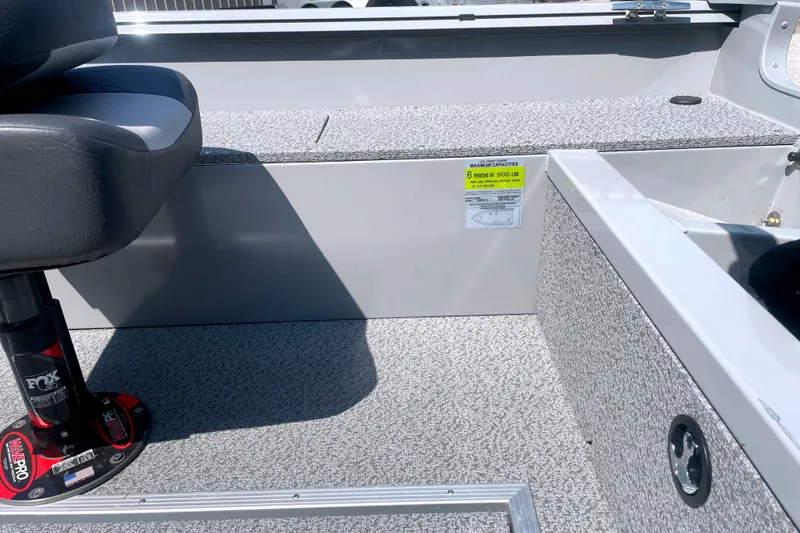 Slide: The Image of 2025 Smoker Craft Freedom 160 TL boat interior with seating and capacity label. - 11