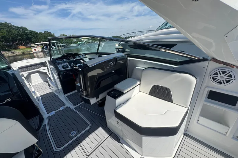 Slide: The Image of 2020 Monterey 298SS Super Sport boat interior with sleek seating and modern dashboard. - 7