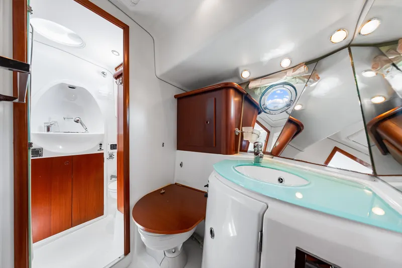 Slide: The Image of Luxurious bathroom in 2006 Beneteau Swift Trawler 42 with modern fixtures and elegant design. - 76