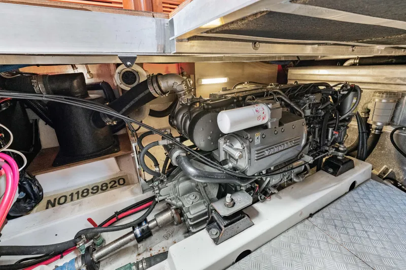 Slide: The Image of Engine room of 2006 Beneteau Swift Trawler 42, showcasing Yanmar engine components. - 79