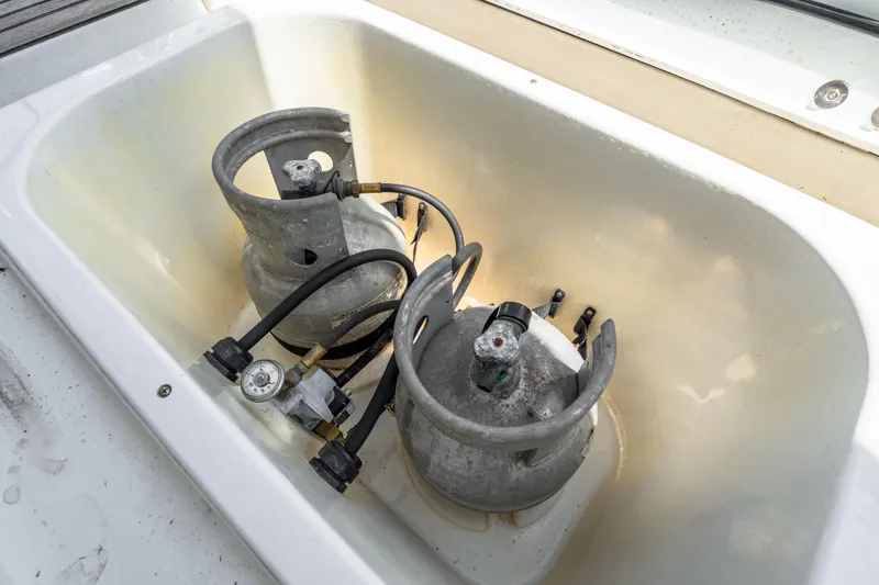 Slide: The Image of Propane tanks in storage compartment on 2006 Beneteau Swift Trawler 42 boat. - 83