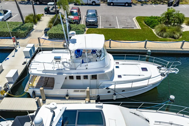 Slide: The Image of 2006 Beneteau Swift Trawler 42 docked at marina, aerial view. - 9