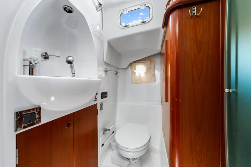 Slide: The Image of Bathroom interior of 2006 Beneteau Swift Trawler 42 with sink and toilet. - 77