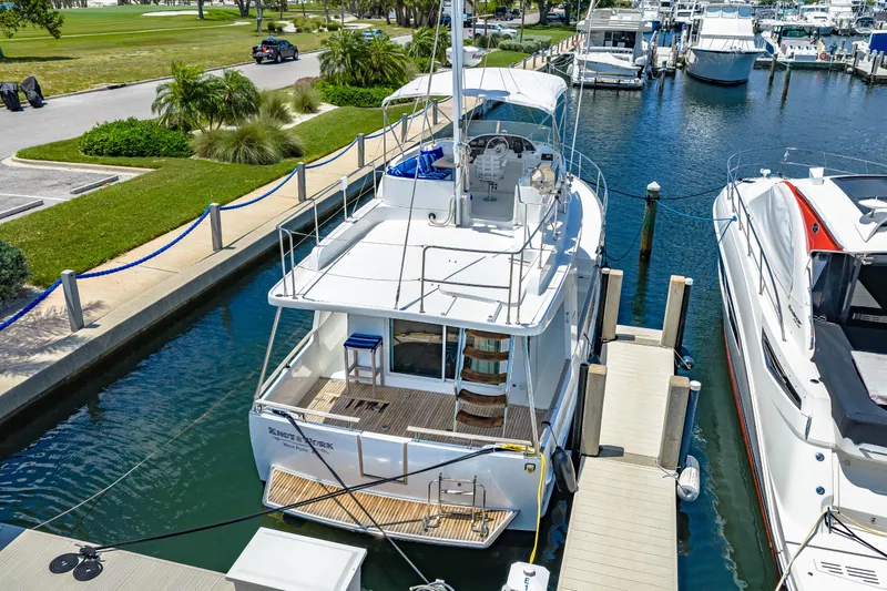 Slide: The Image of 2006 Beneteau Swift Trawler 42 docked at marina, aerial view. - 13