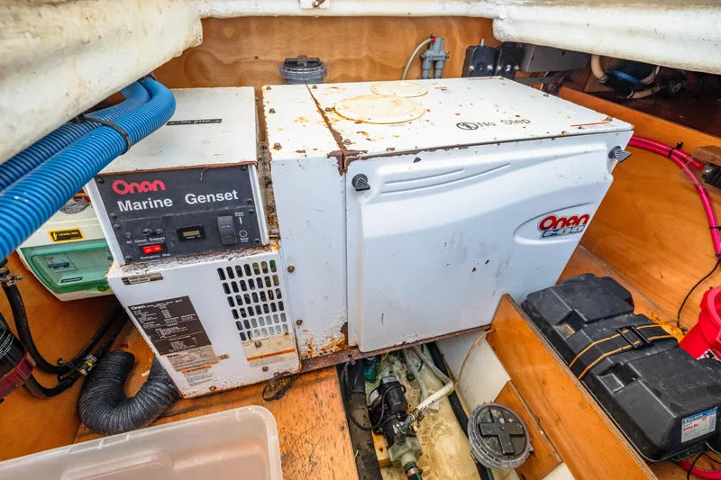 Slide: The Image of Onan Marine Genset in 2006 Beneteau Swift Trawler 42 engine room. - 84