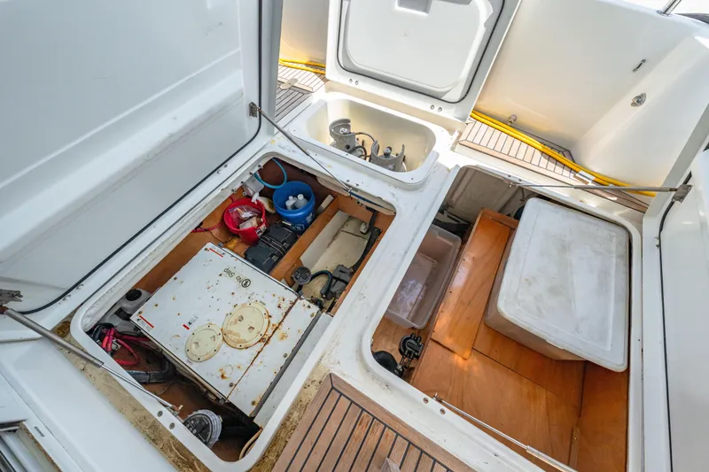 Slide: The Image of 2006 Beneteau Swift Trawler 42 engine compartment with storage and equipment. - 82