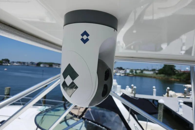 Slide: The Image of Security camera on 2009 Cabo 36 Express yacht overlooking marina. - 25