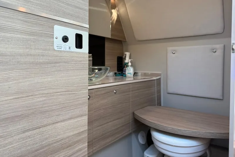 Slide: The Image of 2024 Saxdor 320 GTC interior bathroom with modern wood finish and compact design. - 41