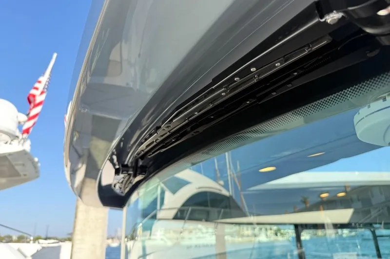 Slide: The Image of Close-up of 2024 Saxdor 320 GTC yacht's sleek design and window detailing. - 48