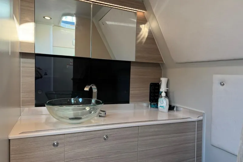 Slide: The Image of Modern bathroom interior of 2024 Saxdor 320 GTC yacht with glass sink and sleek cabinetry. - 40
