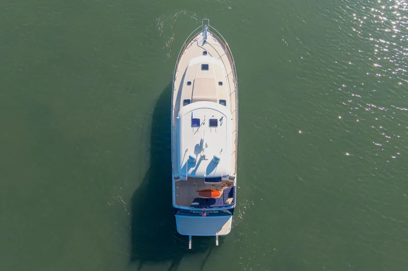 Slide: The Image of Aerial view of 2016 Sabre 48 Salon Express yacht on calm water. - 5