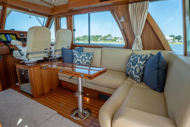 Slide: The Image of Luxurious interior of 2016 Sabre 48 Salon Express yacht with plush seating and elegant decor. - 21