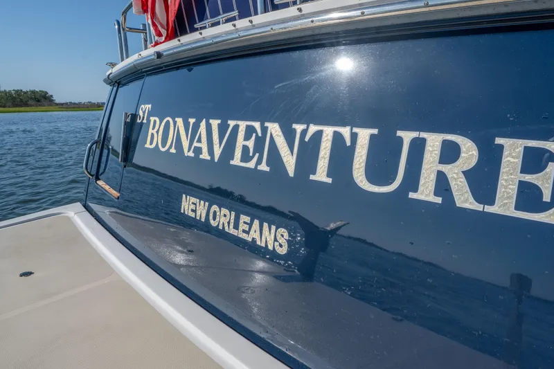 Slide: The Image of 2016 Sabre 48 Salon Express yacht, "St Bonaventure," docked in New Orleans waters. - 7