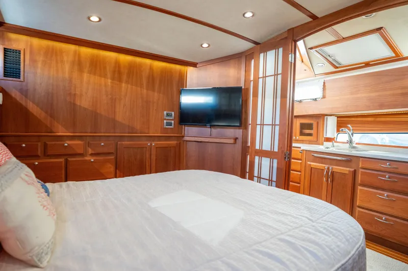 Slide: The Image of Luxurious interior of 2016 Sabre 48 Salon Express yacht with wood finish and modern amenities. - 32