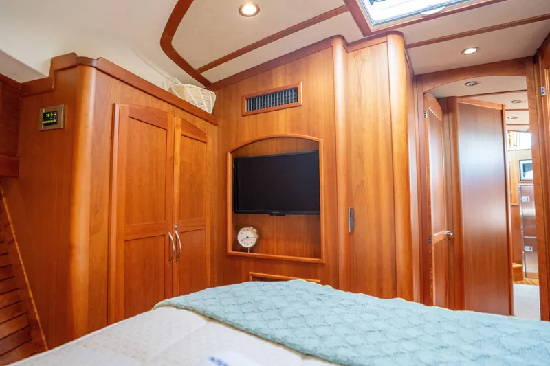 Slide: The Image of Luxurious wood interior of 2016 Sabre 48 Salon Express yacht cabin. - 38