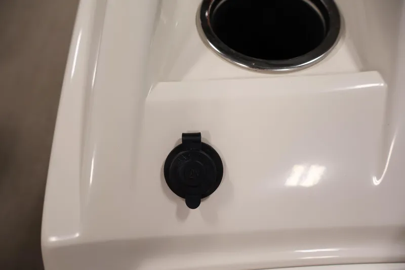 Slide: The Image of 12V outlet and cup holder on 2013 Bennington 20 SLMX boat. - 22