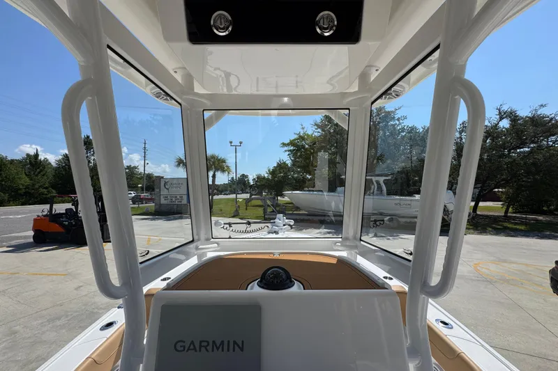 Slide: The Image of Interior view of 2027 Caymas 26 HB boat with Garmin navigation system. - 35
