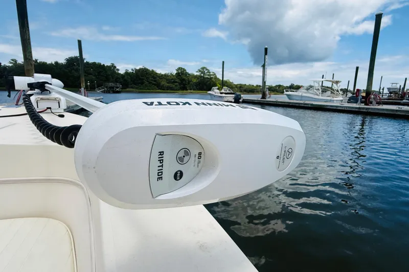 Slide: The Image of Minn Kota Riptide motor on 2000 Jones Brothers Cape Fisherman 1910 boat at marina. - 7