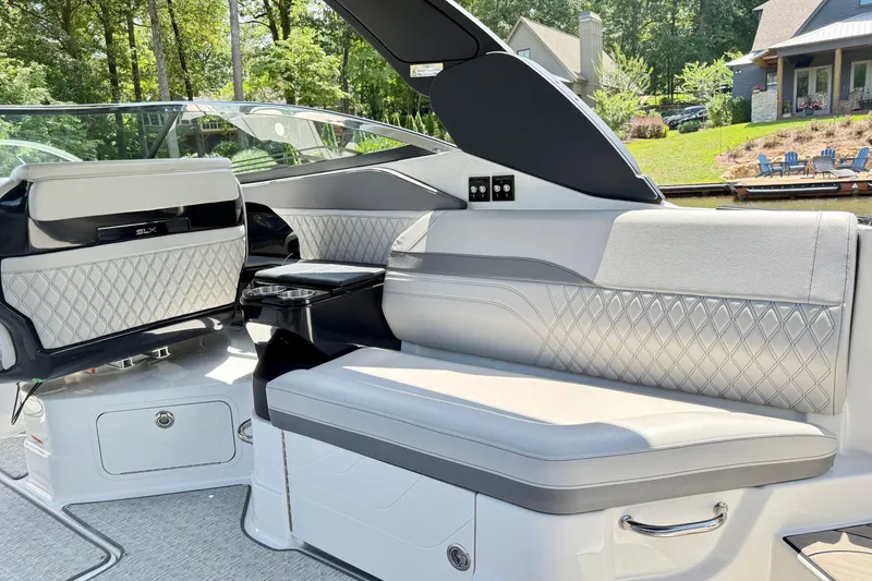 Slide: The Image of 2025 Sea Ray SLX 280 boat interior with luxurious seating and elegant design. - 11