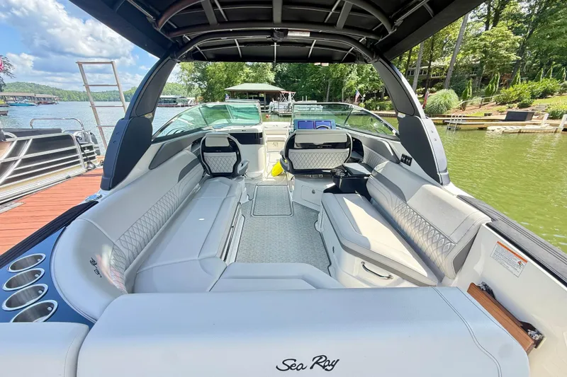 Slide: The Image of 2025 Sea Ray SLX 280 boat interior with luxurious seating and modern design. - 9